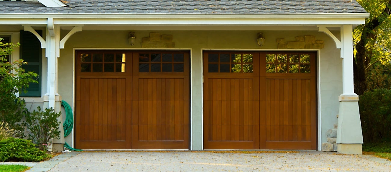 House with Two Wooden Garage Doors House with Two Wooden Garage Doors